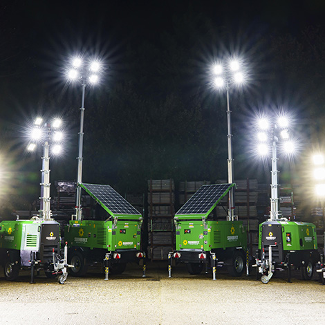 Sunbelt Rentals Tower Lights Illuminated At Night